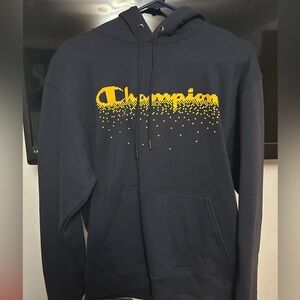 Dark blue Pixel Champion hoodie.
Size: Medium